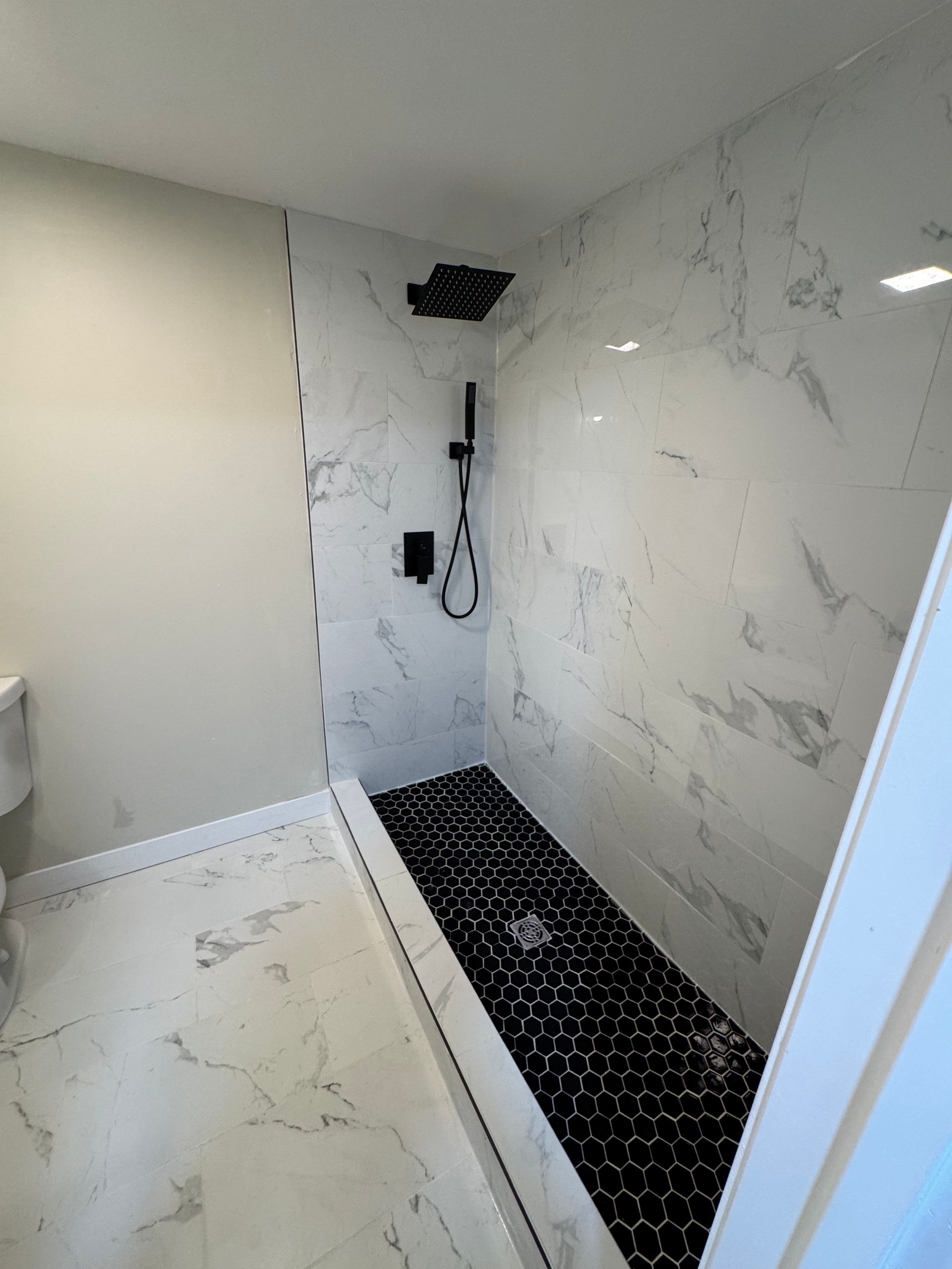 Worn primary bath, fully gutted — before